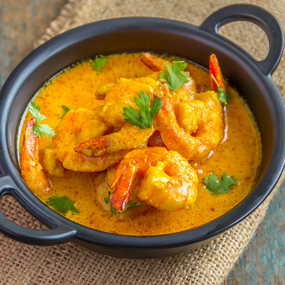 Découvrez notre Curry Crevettes à la carte des plats